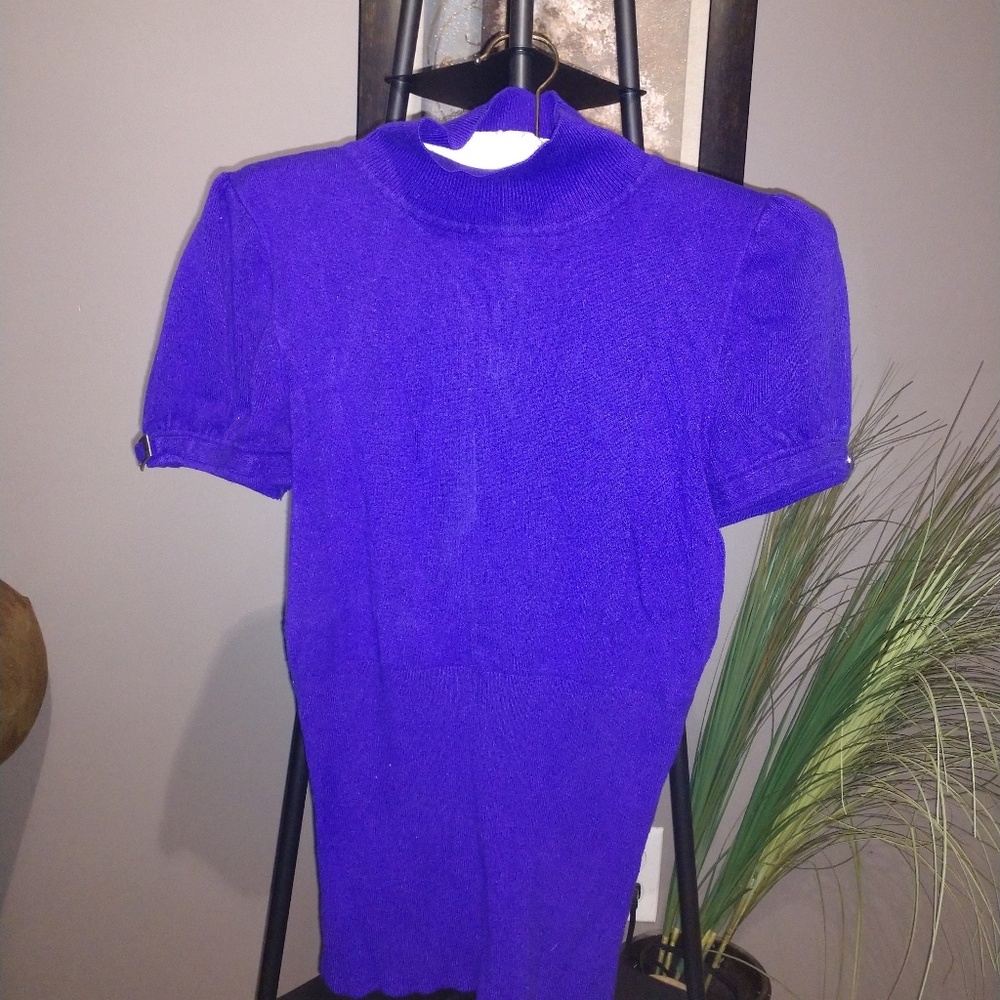 Purple short sleeve sweater, **Clemson fans**